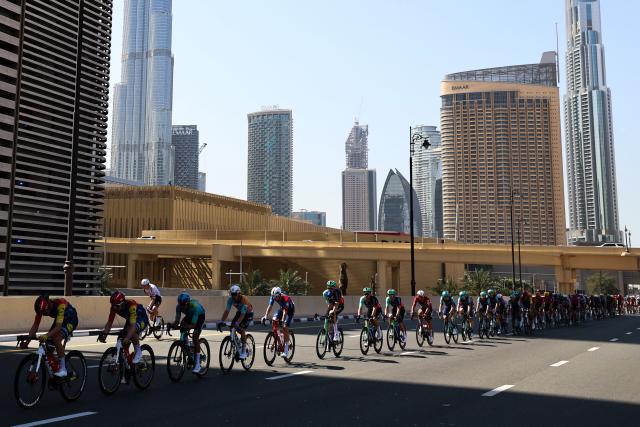 Riders compete during the fifth stage of the UAE Tour cycling race from Dubai’s Al-Mamzar Park to Hamdan Bin Mohammed Smart University in Dubai on February 20, 2026. (Photo by Fadel SENNA / AFP)