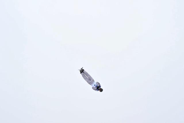 Ukraine's Dmytro Kotovskyi competes in the freestyle skiing men's aerials qualification 2 during the Milano Cortina 2026 Winter Olympic Games at Livigno Aerials & Moguls Park, in Livigno (Valtellina), on February 20, 2026. (Photo by Jeff PACHOUD / AFP)