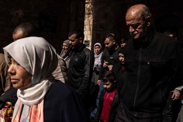 Muslim worshippers walk the Aqsa mosque before the first Friday noon prayers of the holy month of Ramadan in the old city of Jerusalem on February 20, 2026. (Photo by JOHN WESSELS / AFP)