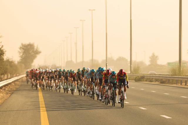 Riders compete during the fifth stage of the UAE Tour cycling race from Dubai’s Al-Mamzar Park to Hamdan Bin Mohammed Smart University in Dubai on February 20, 2026. (Photo by Fadel SENNA / AFP)
