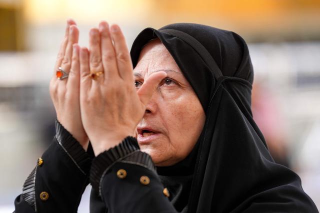 A Muslim worshipper prays in Iraq's central holy city of Najaf on February 19, 2026 during the Muslim fasting month of Ramadan. (Photo by Qassem al-KAABI / AFP)