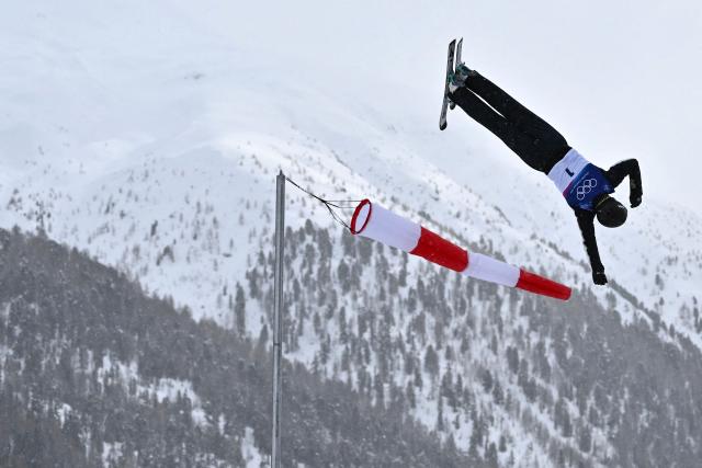 China's Sun Jiaxu competes in the freestyle skiing men's aerials final 1 during the Milano Cortina 2026 Winter Olympic Games at Livigno Aerials & Moguls Park, in Livigno (Valtellina), on February 20, 2026. (Photo by Jeff PACHOUD / AFP)