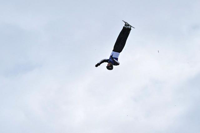China's Sun Jiaxu competes in the freestyle skiing men's aerials final 1 during the Milano Cortina 2026 Winter Olympic Games at Livigno Aerials & Moguls Park, in Livigno (Valtellina), on February 20, 2026. (Photo by Jeff PACHOUD / AFP)