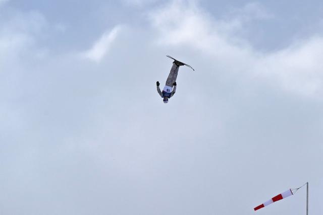 Ukraine's Oleksandr Okipniuk competes in the freestyle skiing men's aerials final 1 during the Milano Cortina 2026 Winter Olympic Games at Livigno Aerials & Moguls Park, in Livigno (Valtellina), on February 20, 2026. (Photo by Jeff PACHOUD / AFP)