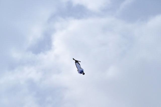 USA's Connor Curran competes in the freestyle skiing men's aerials final 1 during the Milano Cortina 2026 Winter Olympic Games at Livigno Aerials & Moguls Park, in Livigno (Valtellina), on February 20, 2026. (Photo by Jeff PACHOUD / AFP)