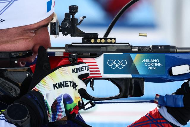 France's Quentin Fillon Maillet shoots as he warms up in the shooting range ahead of the men's biathlon 15km mass start event during the Milano Cortina 2026 Winter Olympic Games at the Anterselva Biathlon Arena (Sudtirol Arena) in Anterselva (Val Pusteria) on February 20, 2026. (Photo by Franck FIFE / AFP)