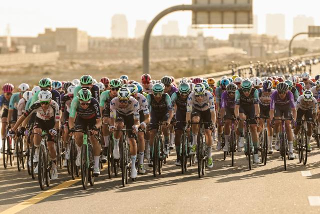 Riders compete during the fifth stage of the UAE Tour cycling race from Dubai’s Al-Mamzar Park to Hamdan Bin Mohammed Smart University in Dubai on February 20, 2026. (Photo by Fadel SENNA / AFP)