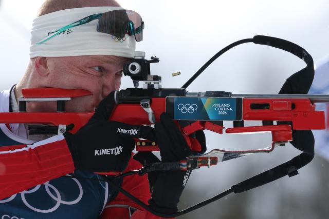 Norway's Johannes Dale-Skjevdal competes at the shooting range during the men's biathlon 15km mass start event during the Milano Cortina 2026 Winter Olympic Games at the Anterselva Biathlon Arena (Sudtirol Arena) in Anterselva (Val Pusteria) on February 20, 2026. (Photo by Odd ANDERSEN / AFP)