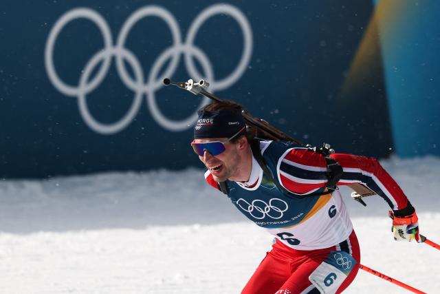 Norway's Sturla Holm Laegreid enters the shooting range during the men's biathlon 15km mass start event during the Milano Cortina 2026 Winter Olympic Games at the Anterselva Biathlon Arena (Sudtirol Arena) in Anterselva (Val Pusteria) on February 20, 2026. (Photo by FRANCK FIFE / AFP)