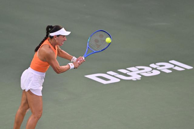 US' Jessica Pegula hits a return against compatriot Amanda Anisimova during their women’s singles semi-final match at the Dubai Duty Free Tennis tournament in Dubai on February 20, 2026. (Photo by Ryan Lim / AFP)