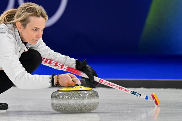 Switzerland's Silvana Tirinzoni competes in the curling women's round robin semi-final between USA and Switzerland during the Milano Cortina 2026 Winter Olympic Games at the Cortina Curling Olympic Stadium in Cortina d’Ampezzo on February 20, 2026. (Photo by Stefano RELLANDINI / AFP)