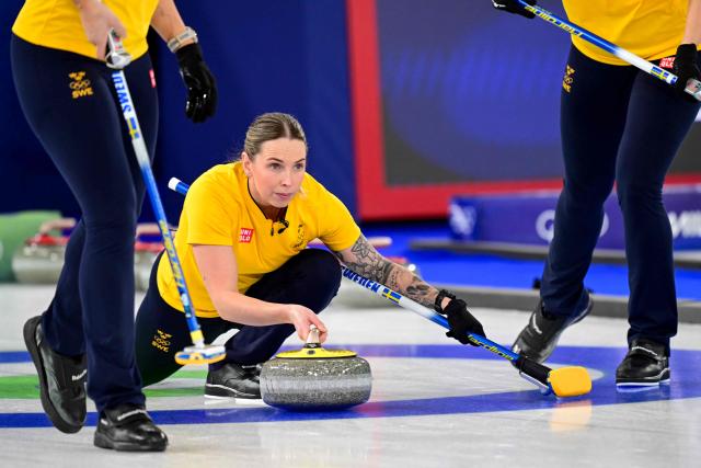 Sweden's Sofia Scharback competes in the curling women's round robin semi-final between Canada and Sweden during the Milano Cortina 2026 Winter Olympic Games at the Cortina Curling Olympic Stadium in Cortina d’Ampezzo on February 20, 2026. (Photo by Stefano RELLANDINI / AFP)
