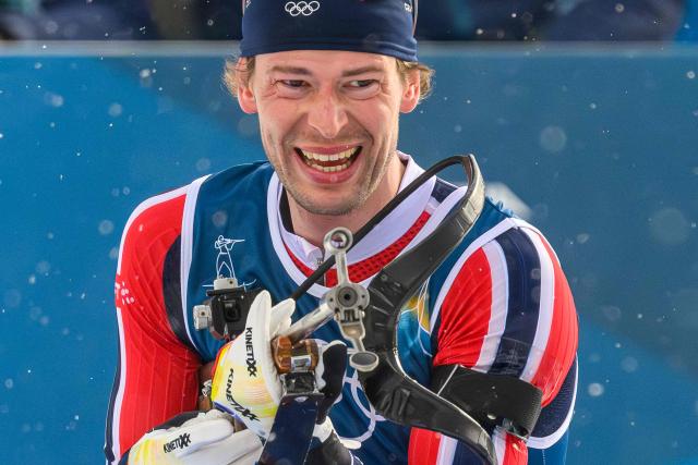 Norway's Sturla Holm Laegreid competes at the shooting range during the men's biathlon 15km mass start event during the Milano Cortina 2026 Winter Olympic Games at the Anterselva Biathlon Arena (Sudtirol Arena) in Anterselva (Val Pusteria) on February 20, 2026. (Photo by FRANCOIS-XAVIER MARIT / AFP)