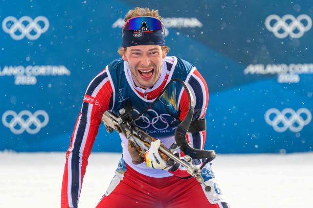 Norway's Sturla Holm Laegreid competes at the shooting range during the men's biathlon 15km mass start event during the Milano Cortina 2026 Winter Olympic Games at the Anterselva Biathlon Arena (Sudtirol Arena) in Anterselva (Val Pusteria) on February 20, 2026. (Photo by FRANCOIS-XAVIER MARIT / AFP)