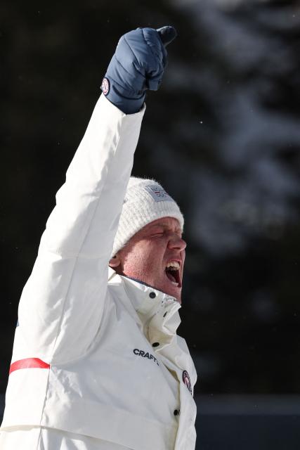 Gold medallist Norway's Johannes Dale-Skjevdal celebrates on the podium of the men's biathlon 15km mass start event during the Milano Cortina 2026 Winter Olympic Games at the Anterselva Biathlon Arena (Sudtirol Arena) in Anterselva (Val Pusteria) on February 20, 2026. (Photo by FRANCK FIFE / AFP)