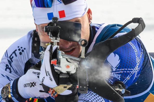 France's Emilien Jacquelin competes at the shooting range during the men's biathlon 15km mass start event during the Milano Cortina 2026 Winter Olympic Games at the Anterselva Biathlon Arena (Sudtirol Arena) in Anterselva (Val Pusteria) on February 20, 2026. (Photo by FRANCOIS-XAVIER MARIT / AFP)