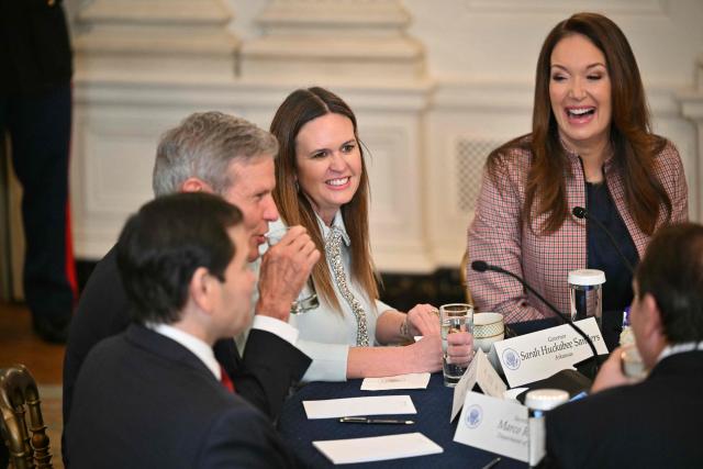 Governor of Arkansas Sarah Huckabee Sanders (2-R) and US Secretary of Agriculture Brooke Rollins (R) attend a working breakfast with governors in the State Dining Room of the White House in Washington, DC on February 20, 2026. (Photo by Mandel NGAN / AFP)