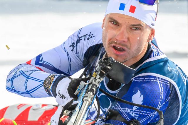 France's Emilien Jacquelin competes at the shooting range during the men's biathlon 15km mass start event during the Milano Cortina 2026 Winter Olympic Games at the Anterselva Biathlon Arena (Sudtirol Arena) in Anterselva (Val Pusteria) on February 20, 2026. (Photo by FRANCOIS-XAVIER MARIT / AFP)