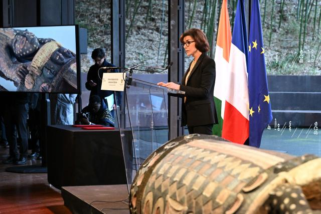France's Culture Minister Rachida Dati addresses the audience during a ceremony for the official restitution to the Republic of Cote d'Ivoire of the sacred talking drum Djidji Ayokwe, confiscated in 1916 by French colonial authorities from the Ebrie people, at the Musee du Quai Branly in Paris on February 20, 2026. (Photo by Bertrand GUAY / AFP)