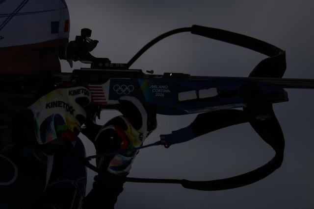 France's Quentin Fillon Maillet competes at the shooting range during the men's biathlon 15km mass start event during the Milano Cortina 2026 Winter Olympic Games at the Anterselva Biathlon Arena (Sudtirol Arena) in Anterselva (Val Pusteria) on February 20, 2026. (Photo by FRANCK FIFE / AFP)