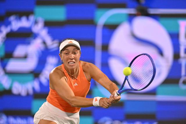 US' Jessica Pegula hits a return against compatriot Amanda Anisimova during their women’s singles semi-final match at the Dubai Duty Free Tennis tournament in Dubai on February 20, 2026. (Photo by Ryan Lim / AFP)