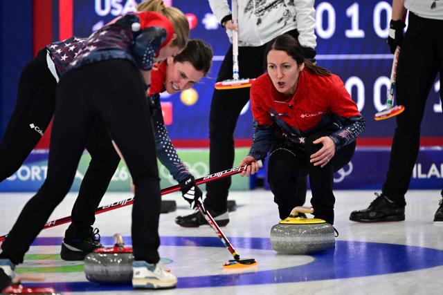 USA's Tara Peterson and USA's Tabitha Peterson compete in the curling women's round robin semi-final between USA and Switzerland during the Milano Cortina 2026 Winter Olympic Games at the Cortina Curling Olympic Stadium in Cortina d’Ampezzo on February 20, 2026. (Photo by Stefano RELLANDINI / AFP)