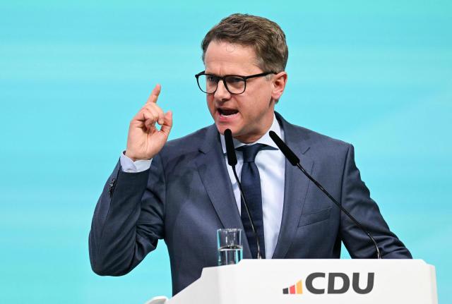 Secretary General of Germany's Christian Democratic Union (CDU) Carsten Linnemann addresses the party congress of the CDU in Stuttgart, southern Germany, on February 20, 2026. (Photo by THOMAS KIENZLE / AFP)