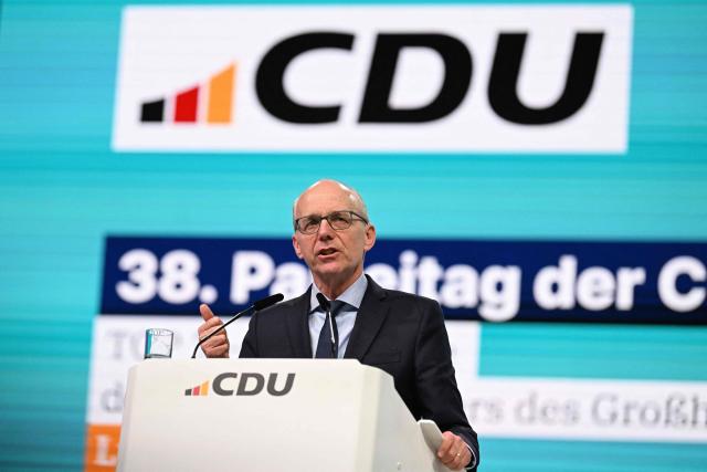 Luxembourg's Prime Minister Luc Frieden addresses the party congress of Germany's Christian Democratic Union (CDU) in Stuttgart, southern Germany, on February 20, 2026. (Photo by THOMAS KIENZLE / AFP)