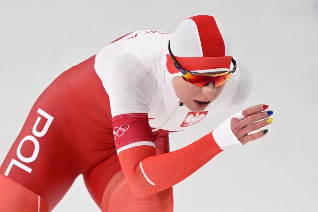 Poland's Natalia Czerwonka wears nail polish in the color of the Olympic Rings as she competes in the speed skating women's 1500m during the Milano Cortina 2026 Winter Olympic Games at Milano Speed Skating Stadium in Milan on February 20, 2026. (Photo by Daniel MUNOZ / AFP)