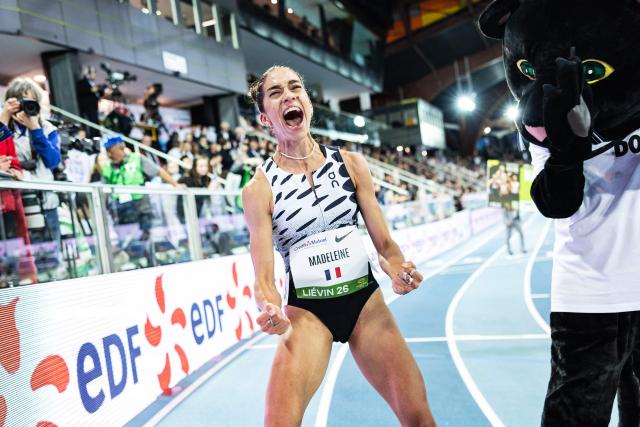 France's Sarah Madeleine celebrates breaking a national record in the 3000m women final at the Athletics meeting "Hauts-de-France Pas-de-Calais" as part of the World Indoor Tour Gold, in Lievin, northern France on February 19, 2026. (Photo by Sameer Al-DOUMY / AFP)