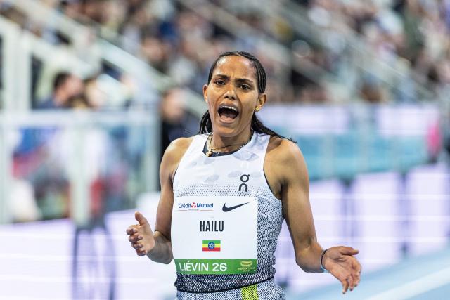 Ethiopia's Freweyni Hailu competes and wins in the 3000m women final at the Athletics meeting "Hauts-de-France Pas-de-Calais" as part of the World Indoor Tour Gold, in Lievin, northern France on February 19, 2026. (Photo by Sameer Al-DOUMY / AFP)