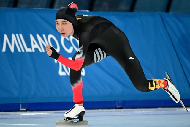 China's Han Mei competes in the speed skating women's 1500m during the Milano Cortina 2026 Winter Olympic Games at Milano Speed Skating Stadium in Milan on February 20, 2026. (Photo by Piero CRUCIATTI / AFP)