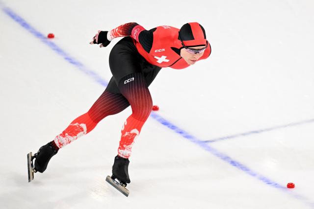 Switzerland's Kaitlyn Anne McGregor competes in the speed skating women's 1500m during the Milano Cortina 2026 Winter Olympic Games at Milano Speed Skating Stadium in Milan on February 20, 2026. (Photo by Daniel MUNOZ / AFP)