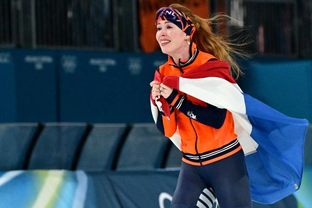 Netherlands' Antoinette Rijpma - de Jong celebrates after winning gold in the speed skating women's 1500m during the Milano Cortina 2026 Winter Olympic Games at Milano Speed Skating Stadium in Milan on February 20, 2026. (Photo by Piero CRUCIATTI / AFP)