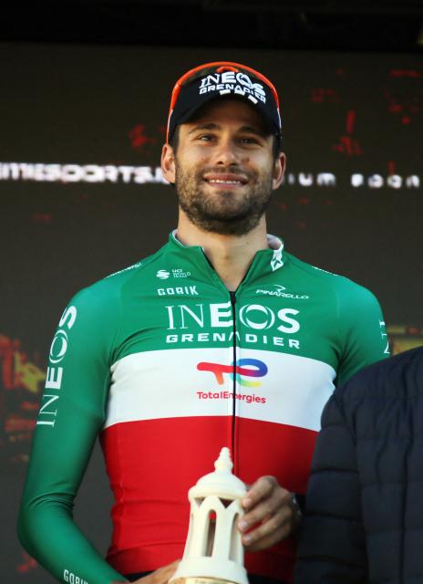 INEOS Grenadiers Italian cyclist Filippo Ganna celebrates on the podium after winning the stage 3 of the Algarve Tour, a time trial run in Vilamoura on February 20, 2026. (Photo by João Matos / AFP)