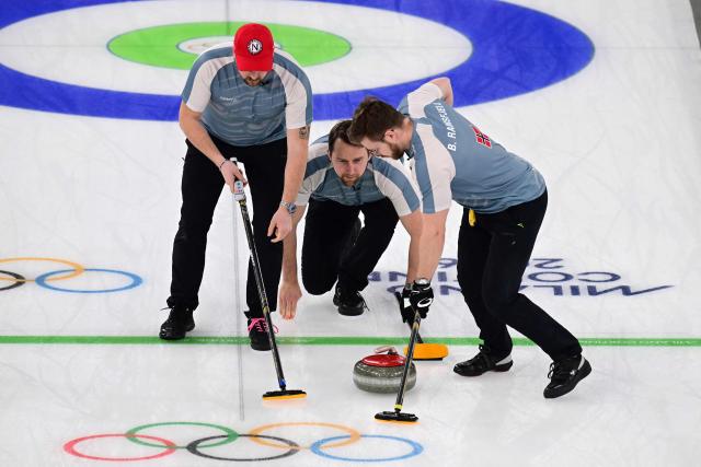Norway's Martin Sesaker, Norway's Gaute Nepstad and Norway's Bendik Ramsfjell compete in the curling men's round robin bronze medal game between Norway and Switzerland during the Milano Cortina 2026 Winter Olympic Games at the Cortina Curling Olympic Stadium in Cortina d’Ampezzo on February 20, 2026. (Photo by Stefano RELLANDINI / AFP)