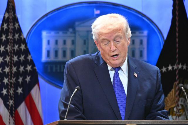 US President Donald Trump speaks during a press conference in the Brady Press Briefing Room of the White House in Washington, DC, on February 20, 2026. US President Donald Trump will hold a press conference Friday to discuss the Supreme Court's ruling against a major part of his tariffs, spokeswoman Karoline Leavitt said. (Photo by Mandel NGAN / AFP)