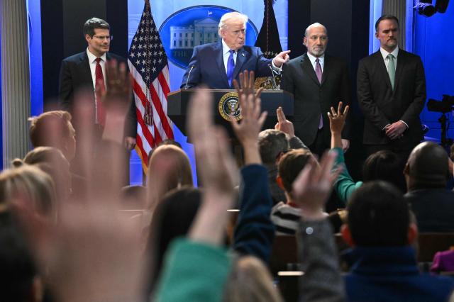US President Donald Trump takes question from reporters during a press conference in the Brady Press Briefing Room of the White House in Washington, DC, on February 20, 2026. US President Donald Trump will hold a press conference Friday to discuss the Supreme Court's ruling against a major part of his tariffs, spokeswoman Karoline Leavitt said. (Photo by Mandel NGAN / AFP)