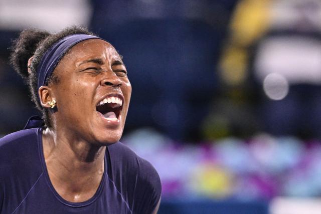 US' Coco Gauff reacts during her match against Ukraine's Elina Svitolina in the women’s singles semi-final match  at the Dubai Duty Free Tennis tournament in Dubai on February 20, 2026. (Photo by Ryan Lim / AFP)