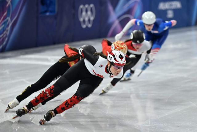 Canada's Courtney Sarault competes in the short track speed skating women's 1500m quarter-final during the Milano Cortina 2026 Winter Olympic Games at Milano Ice Skating Arena in Milan on February 20, 2026. (Photo by Gabriel BOUYS / AFP)