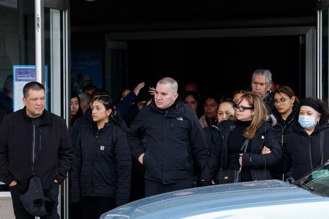 Ruben Torres (C) and Sandibell Hidalgo (front, 2R), praents of the late Ofelia Torres, depart William Parish following their daughter's funeral Mass in Chicago, Illinois on February 20 2026. Torres gained attention in October 2025 when she posted an Instagram video calling for the release of her father, Ruben Torres Maldonado, from ICE detention while raising awareness about other families in a similar situation. Torres died from a rare form of cancer on February 13. (Photo by KAMIL KRZACZYNSKI / AFP)