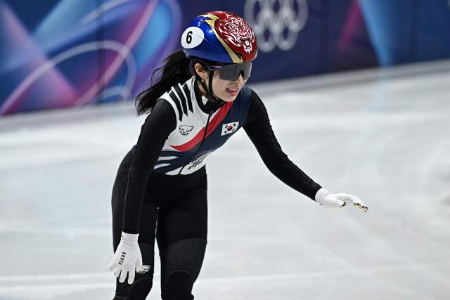 South Korea's Kim Gil-li reacts after winning gold in the short track speed skating women's 1500m final during the Milano Cortina 2026 Winter Olympic Games at Milano Ice Skating Arena in Milan on February 20, 2026. (Photo by Gabriel BOUYS / AFP)