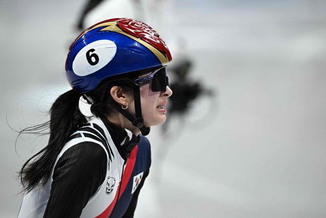 South Korea's Kim Gil-li reacts after winning gold in the short track speed skating women's 1500m final during the Milano Cortina 2026 Winter Olympic Games at Milano Ice Skating Arena in Milan on February 20, 2026. (Photo by Gabriel BOUYS / AFP)