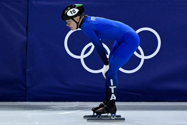 Italy's Arianna Fontana reacts after competing in the short track speed skating women's 1500m final during the Milano Cortina 2026 Winter Olympic Games at Milano Ice Skating Arena in Milan on February 20, 2026. (Photo by WANG Zhao / AFP)