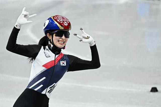 South Korea's Kim Gil-li reacts after winning gold in the short track speed skating women's 1500m final during the Milano Cortina 2026 Winter Olympic Games at Milano Ice Skating Arena in Milan on February 20, 2026. (Photo by Gabriel BOUYS / AFP)