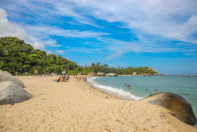 This general view shows of National Park Tayrona in Magdalena Department, Colombia on July 30 2025. Defense Minister Pedro Sanchez said that extortion and pressure from ‘Los Pachenca’, a paramilitary group also known as the Conquistador Self-Defense Forces of the Sierra Nevada, forced the temporary closure of the park. (Photo by Marco PERDOMO / AFP)