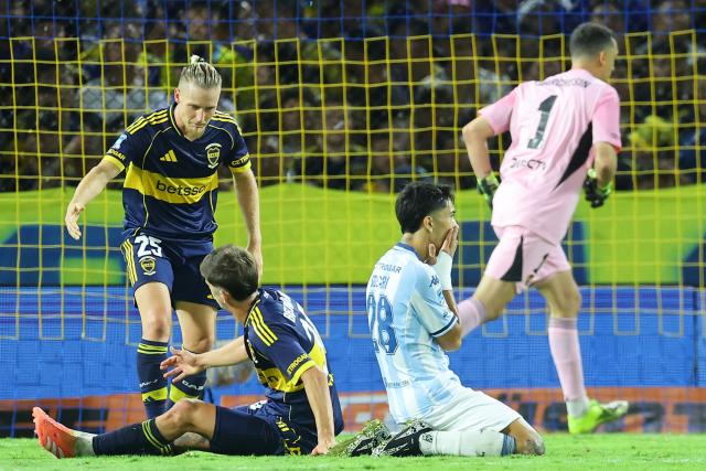 Racing's forward #28 Santiago Solari (2nd R) reacts after missing a scoring chance during the Argentine Professional Football League 2026 Apertura Tournament match between Boca Juniors and Racing at La Bombonera Stadium in Buenos Aires on February 20, 2026. (Photo by ALEJANDRO PAGNI / AFP)
