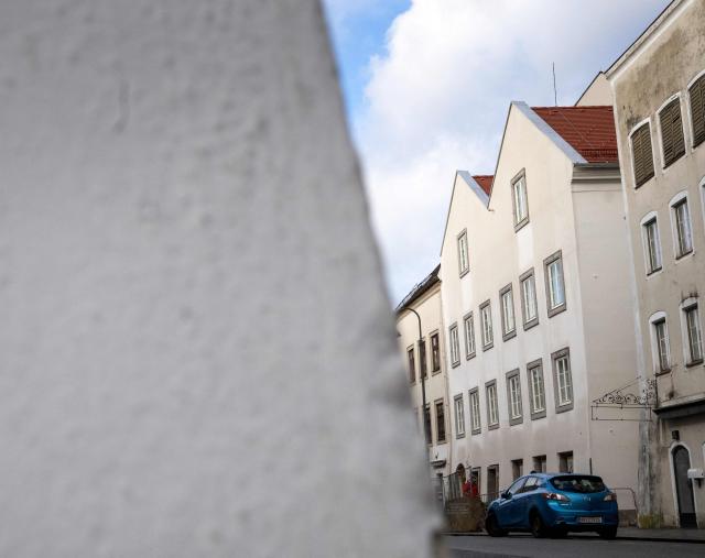 Picture taken on February 17, 2026 shows the birth house of former German dictator Adolf Hitler that is turned into a police station, in Braunau am Inn, Austria. The controversial redesign of the house in the northern Austrian town of Braunau started in 2023. Following years of legal wrangling, the government took control of the dilapidated building in 2016 and decided to turn the house, where Hitler was born in 1889, into a police station. (Photo by Joe Klamar / AFP)