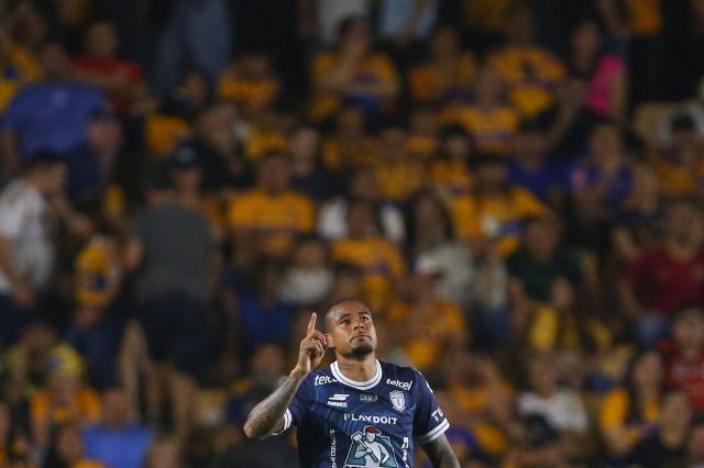 Pachuca's Brazilian forward #29 Kenedy celebrates scoring his team's second goal during the Liga MX Clausura football match between Tigres and Pachuca at the University Stadium (UANL) in Monterrey, Mexico, on February 20, 2026. (Photo by Julio Cesar AGUILAR / AFP)