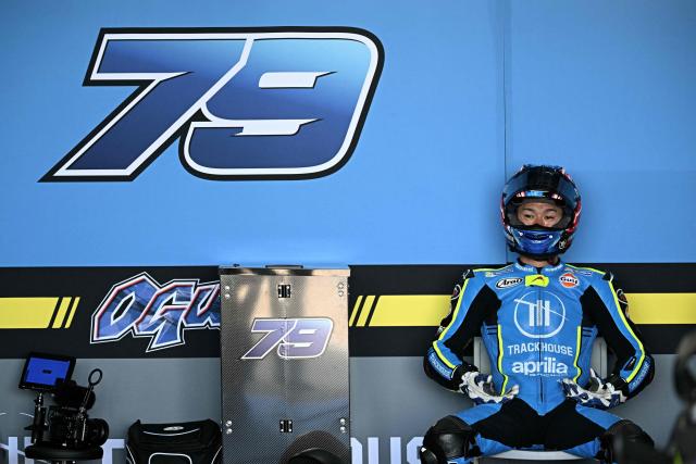 Trackhouse MotoGP's Japanese rider Ai Ogura sits in the garage during the first day of the 2026 MotoGP pre-season test at the Buriram International Circuit in Buriram on February 21, 2026. (Photo by Lillian SUWANRUMPHA / AFP)